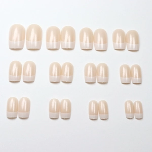 Classic white French tip press-on nails with 24 pieces in a pearlescent nude finish