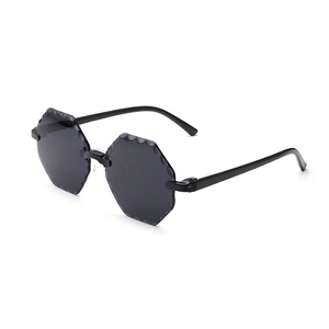 Kids rimless octagonal sunglasses with wavy edge lenses and sleek black temples