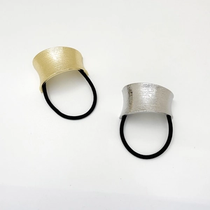 U-shaped brushed metal ponytail holders in gold and silver finish with black elastic bands