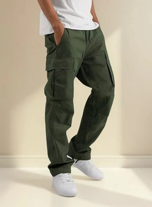 Detailed close-up of side cargo pockets on dark green cotton twill utility pants for men