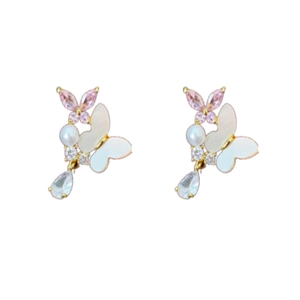 Boucles d'oreilles papillon avec cristaux roses, perles blanches et détails dorés