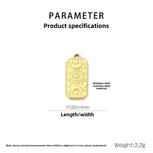 Detail view of 22x10mm gold stainless steel pendant with sun eye and moon engravings