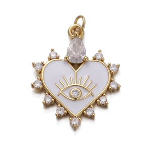 Detail of gold heart pendant with white enamel evil eye and sparkling zircon stones