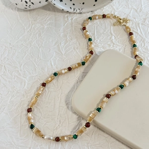 Elegant beaded shell necklace with colorful stones and white baroque pearl drop