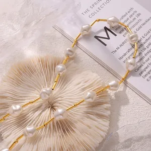 French vintage pearl and 18k gold plated titanium steel necklace on white coral