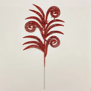 Close-up of red glitter decorative leaves for Christmas tree decoration and floral arrangements