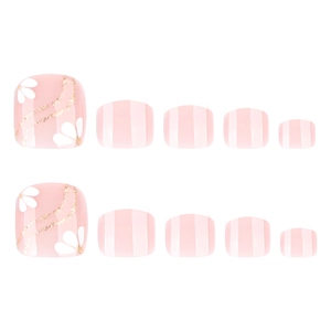 Pink press-on toenails with white flower petals and golden glitter accents for women