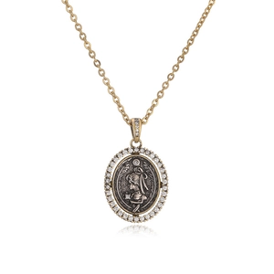 Vintage Roman coin pendant necklace featuring a black portrait relief and sparkling crystals