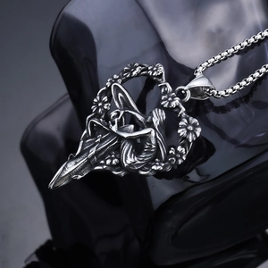 Silver stainless steel heart necklace with embossed fairy and flower pendant on box chain
