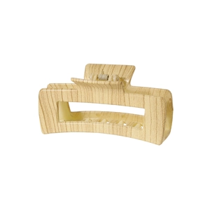 Close-up of a 10.5cm rectangular hollow hair claw with cream faux wood grain pattern