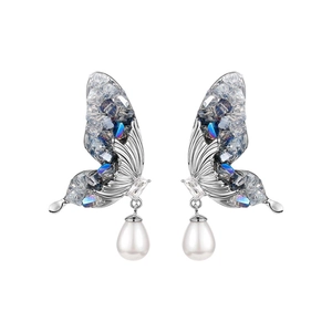 Elegant silver butterfly earrings with blue crystals and hanging teardrop pearls