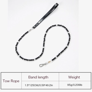 Detail view of pearl beaded pet leash with black leather handle and sizing chart
