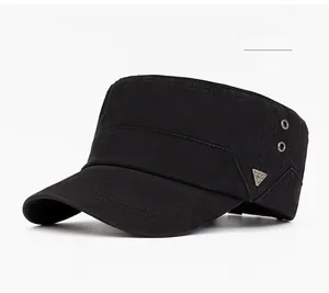 Detail of black cotton cadet cap with metallic ventilation eyelets and decorative badge
