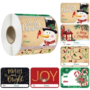 Rouleaux d'étiquettes de Noël avec bonhomme de neige et lanterne pour emballages cadeaux