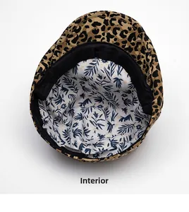 Internal view of leopard print cotton hat showing tropical leaf lining and sweatband