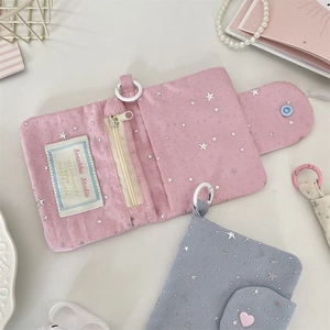 Close-up of portable star pattern canvas wallets with zipper and hanging loops