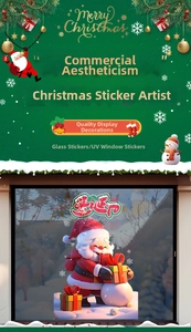 Detail showing UV printed Santa Claus window stickers on a glass storefront display