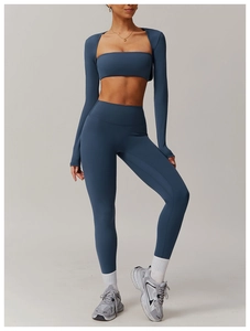 Detailed view of 3-piece brushed yoga set with cropped jacket, sports bra, and high-waist leggings