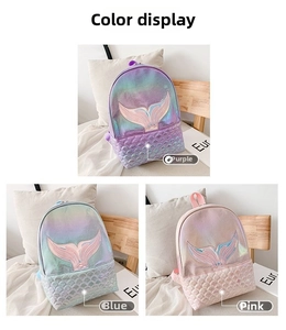 Detailed close-up showing purple, blue, and pink laser mermaid backpacks with fish scale patterns