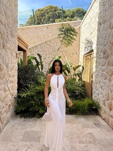 Elegant white halter neck long dress with cut-out details and slim fit ruched waist