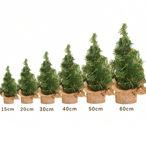 Mini artificial Christmas trees with burlap base in six sizes from 15cm to 60cm height