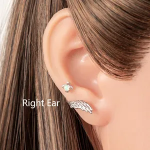 Detailed silver wing ear cuff and iridescent opal flower stud earring set for women