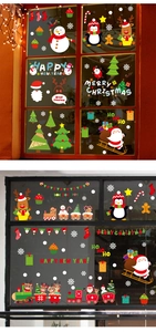 Detailed Christmas window decals featuring Santa, reindeer, and snowman decorations