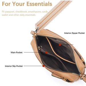 Detail of caramel crossbody bag interior showing three pockets and striped shoulder strap