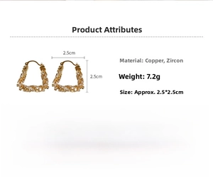 Detail of gold-plated U-shaped earrings with zircons, size 2.5cm by 2.5cm