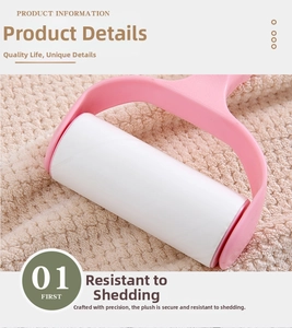 Close-up of pink lint roller removing debris from brown fabric with tear-off sticky paper