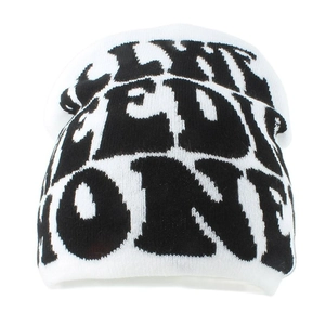 White knitted beanie with black letters pattern on a clean white background