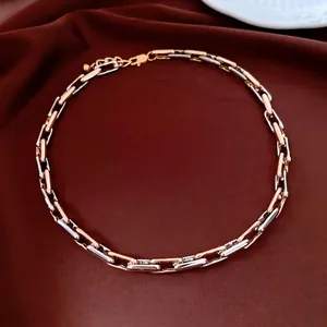 Two-tone gold and silver paperclip chain necklace with adjustable lobster clasp closure