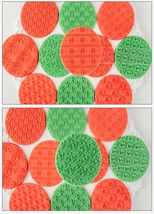 Detailed close-up of Christmas cookies featuring embossed snowflakes and reindeer patterns