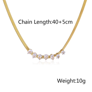Detail view of flat snake chain necklace with zircon teardrops, 40+5cm length and 10g weight