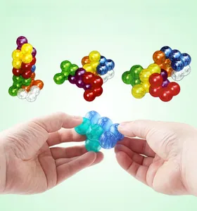 Macro shot of colorful translucent magnetic building blocks showing assembly details