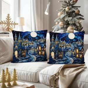 Blue Christmas pillowcases with stained glass castle snow scene on a white sofa