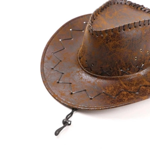 Close-up of distressed brown cowboy hat with X-shaped stitching and adjustable chin strap