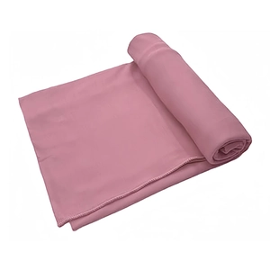 Detail of pink milk silk headscarf showing soft texture and reinforced stitching