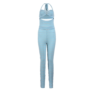 Detail of blue and white striped knit texture on halter crop top and matching trousers