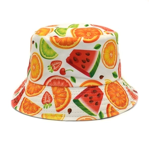 Detailed view of high-quality cotton fabric with vibrant watermelon and fruit prints