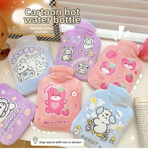 Three cute plush hot water bags in pink, blue, and purple with cartoon animal embroidery