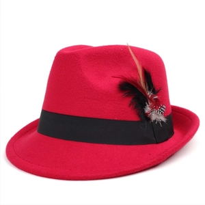 Classic red wool felt fedora with black ribbon and stylish feather accent for men and women