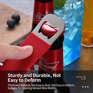 Thickened stainless steel bottle opener with a red PVC handle opening a beer bottle