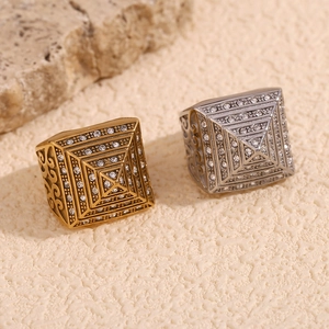 Men's 18K gold and silver pyramid rings with zircon pavé and scroll engravings