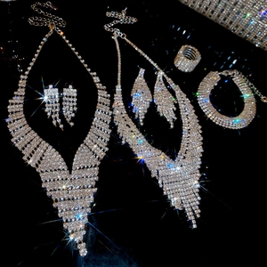 Sparkling silver jewelry set with V-shaped rhinestone fringe necklace and earrings