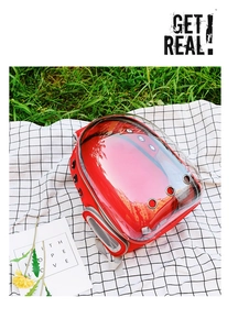 Macro detail of red space capsule cat backpack with side metal ventilation holes