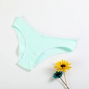 Flat lay of soft mint green ribbed cotton panties for women with a low-rise fit on white background