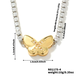 Detail of gold butterfly pendant with silver rhinestone chain and precise dimensions