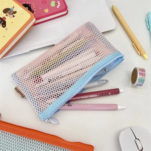Detail of a pink and blue mesh pencil case showing the semi-transparent nylon fabric