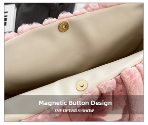 Close-up of pink plush tote bag showing internal cream lining and magnetic gold buckle